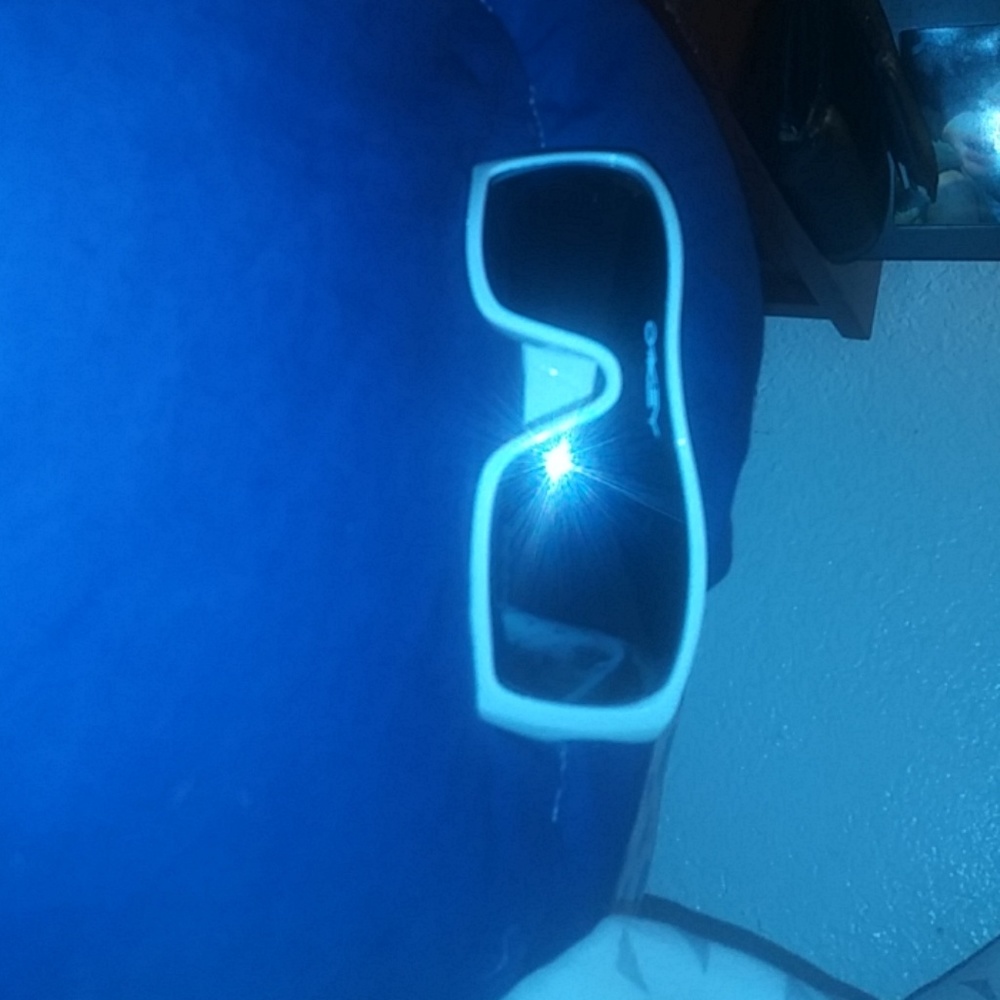 Used white mirrored lense unisex Oakley sunglasses
